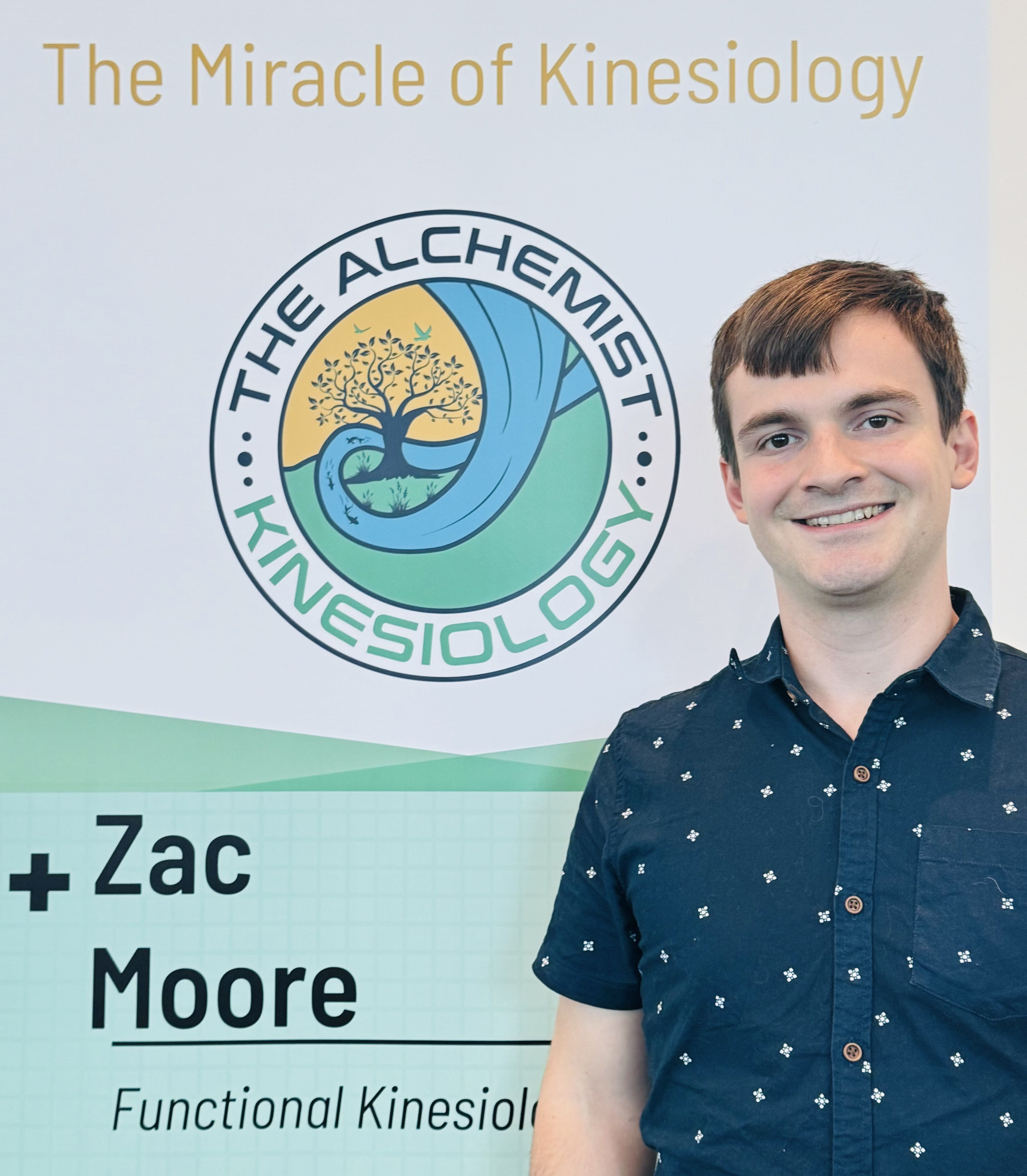Zac Moore, Kinesiology & HeartMath practitioner, standing outdoors & smiling towards the camera. Located in Gosnells, Maddington, Thornlie, and surrounds.